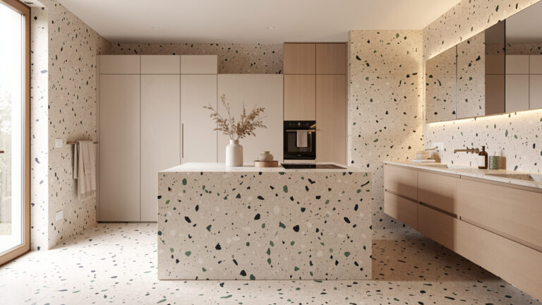 Intérieur contemporain avec sol en terrazzo, revêtements muraux assortis et détails décoratifs dans une palette chaleureuse et minimaliste.