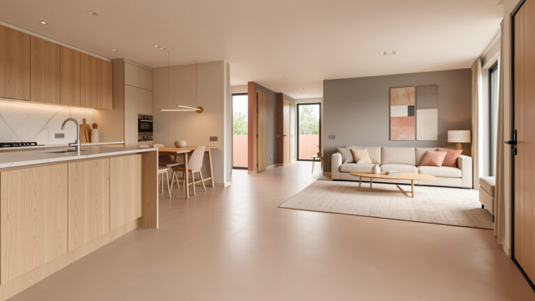 Intérieur contemporain avec un sol en résine uniforme dans des tons beige, gris doux et terracotta, reliant la cuisine, le salon et le couloir.